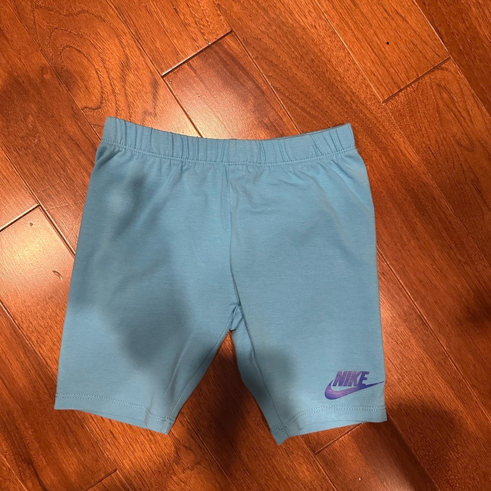 Nike Kids Blue Shorts with Purple Logo